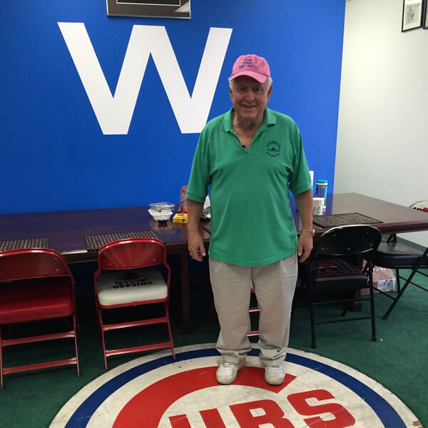 Who Is The Pink Hat Guy Behind Home Plate At Wrigley Field?